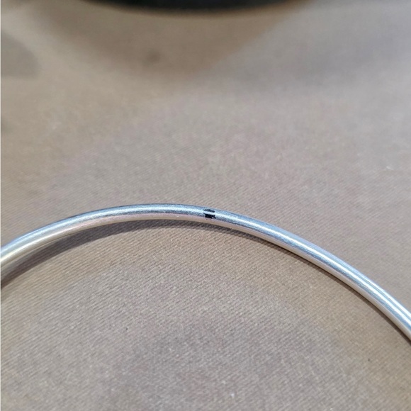 Simplistic Silver Knot Bangle - Picture 9 of 13